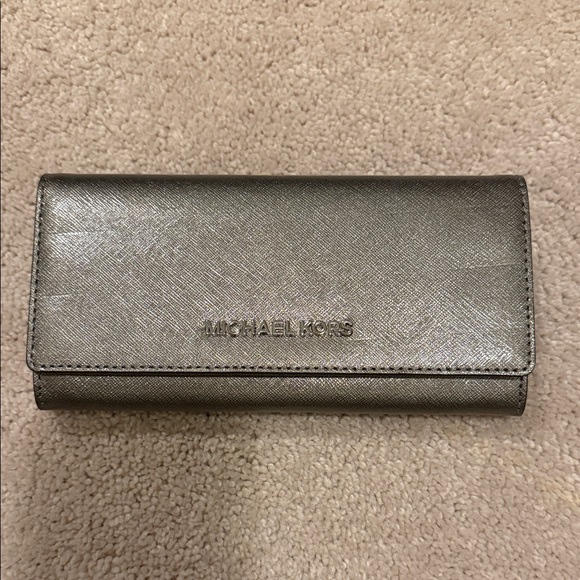 Michael Kors Handbags - Michael Kors Metallic Silver wallet